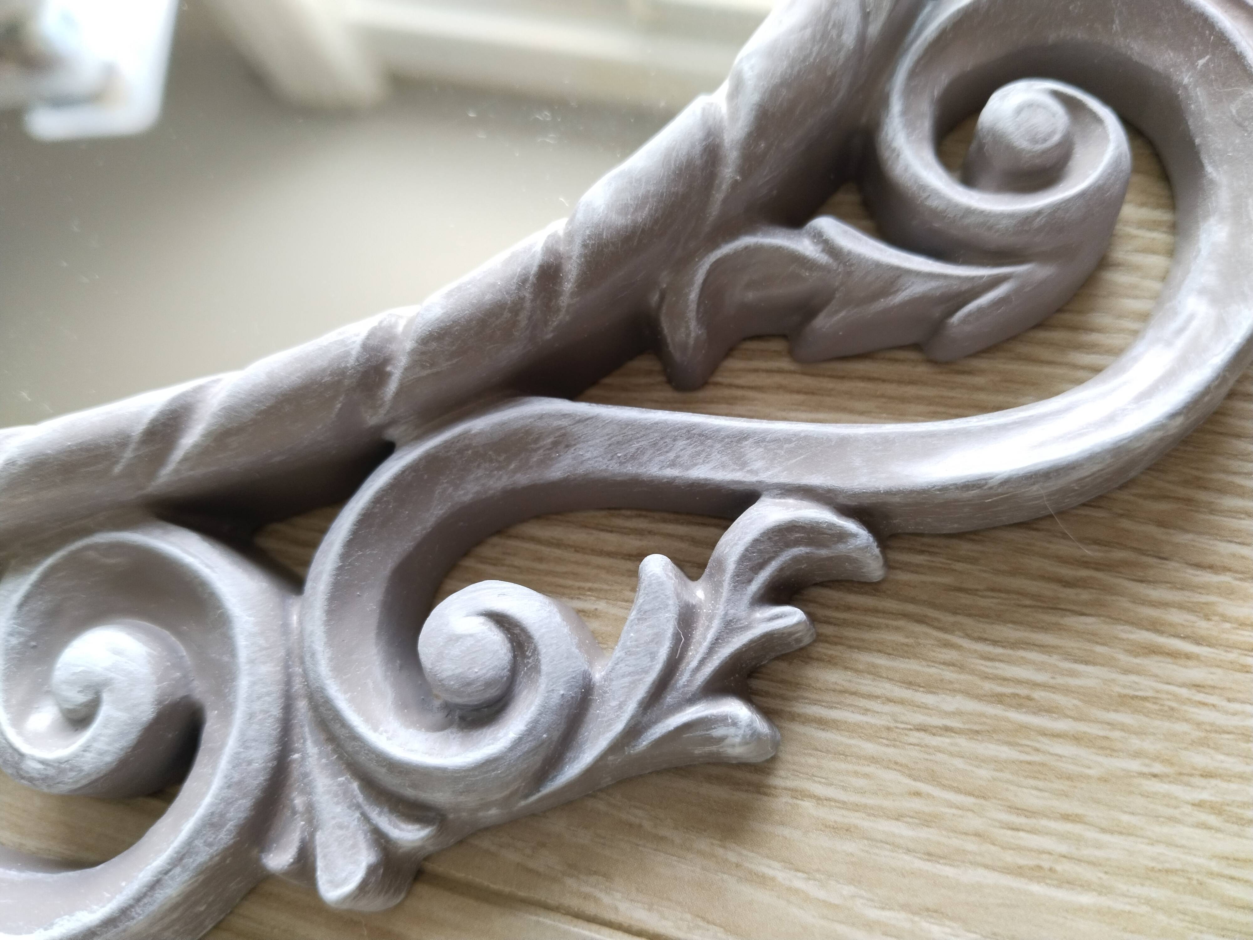 Louis XVI style patinated oval mirror