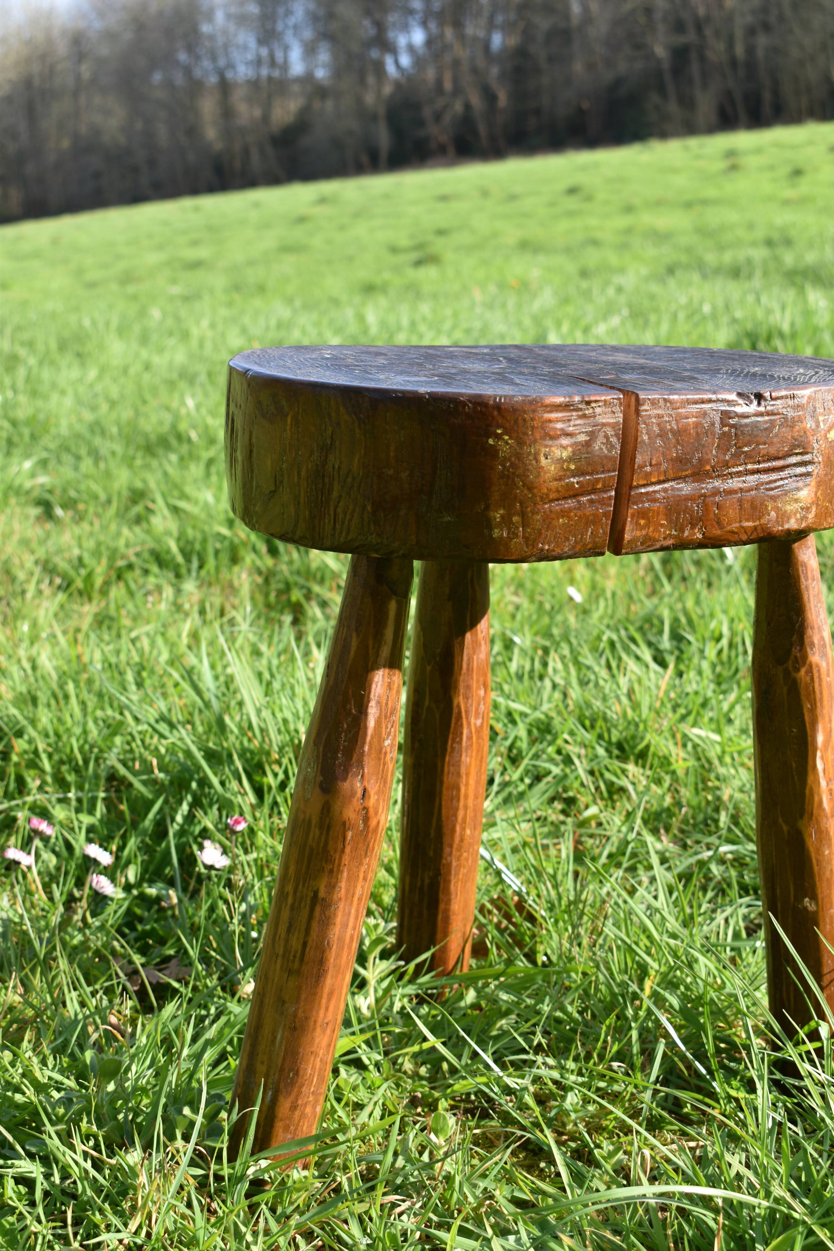 Ancient tripod brutalist stool