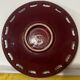 Burgundy and gold openwork plate in ceramic from Saint-Clement, 1950s.