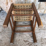 Wooden stool with woven rope seat