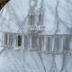 Set of 12 vintage glass knife rests in clear moulded glass.