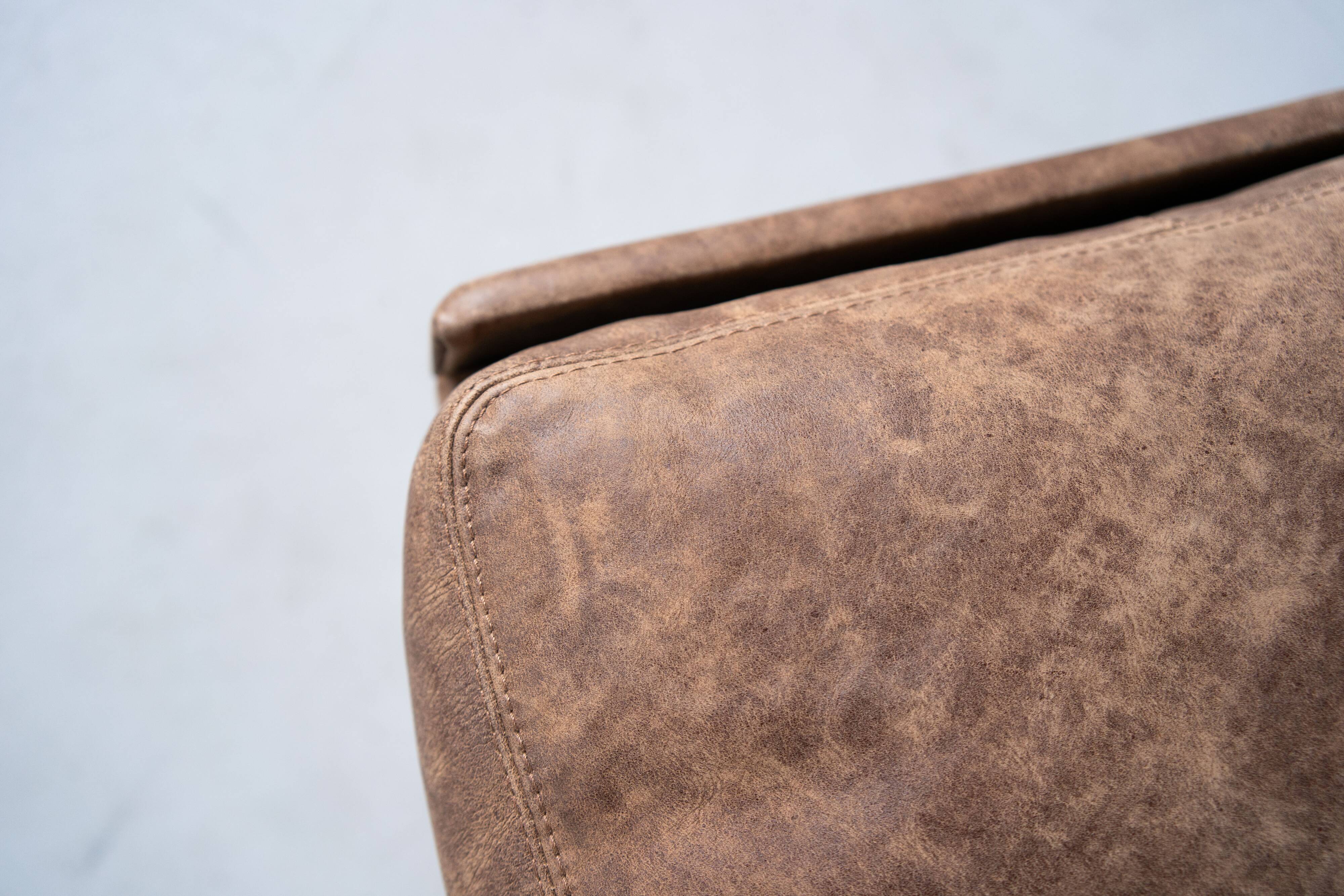 Vintage swing armchair and stool in leather by reinhold adolf for cor, 1970s, set of 2