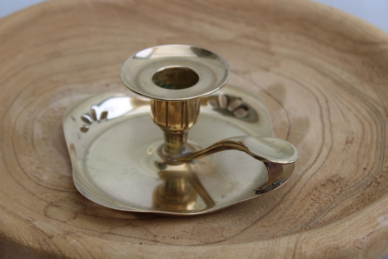 Golden brass candle holder