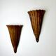 Pair of Art Deco carved wood wall sconces, France, 1930s