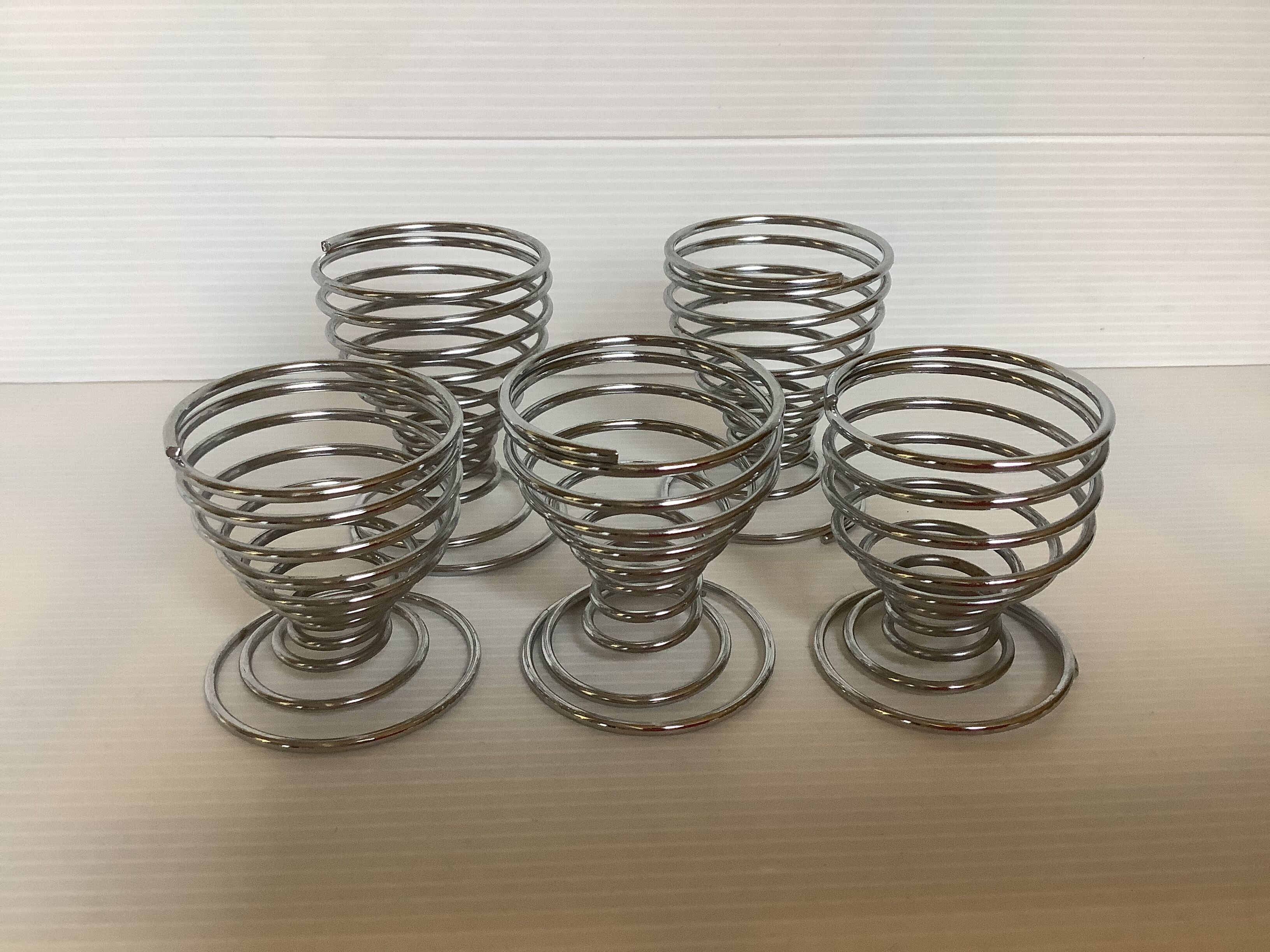 Five spiral spring eggcups