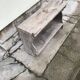 Small country bench in grey pine, rustic antique style with storage shelf.