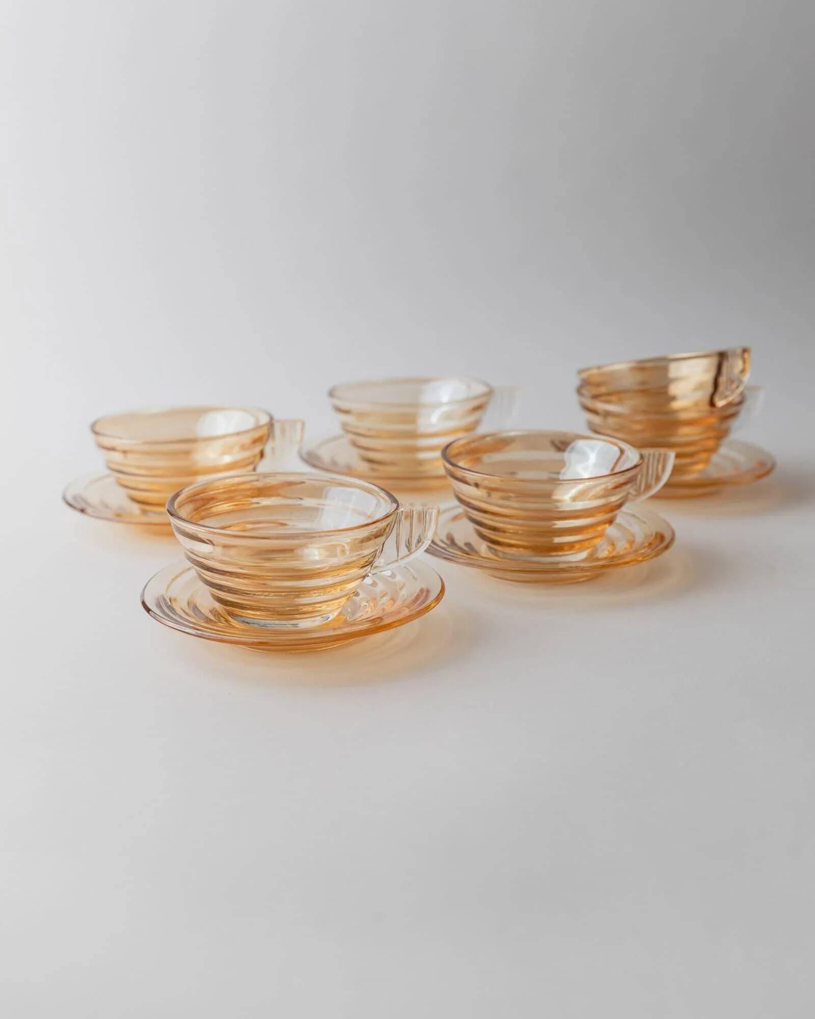 Vintage 1950s glass coffee cups, set of 5, iridescent peach ribbed glass with saucers, Italian design Gondolo.