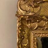 Miroir régence en bois sculpté doré début XVIIIème siècle