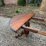 Large oval mahogany dining table from the 19th century Restoration period