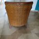 Woven rattan armchair and exotic wood in colonial style, 1980s.
