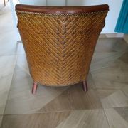 Woven rattan armchair and exotic wood in colonial style, 1980s.