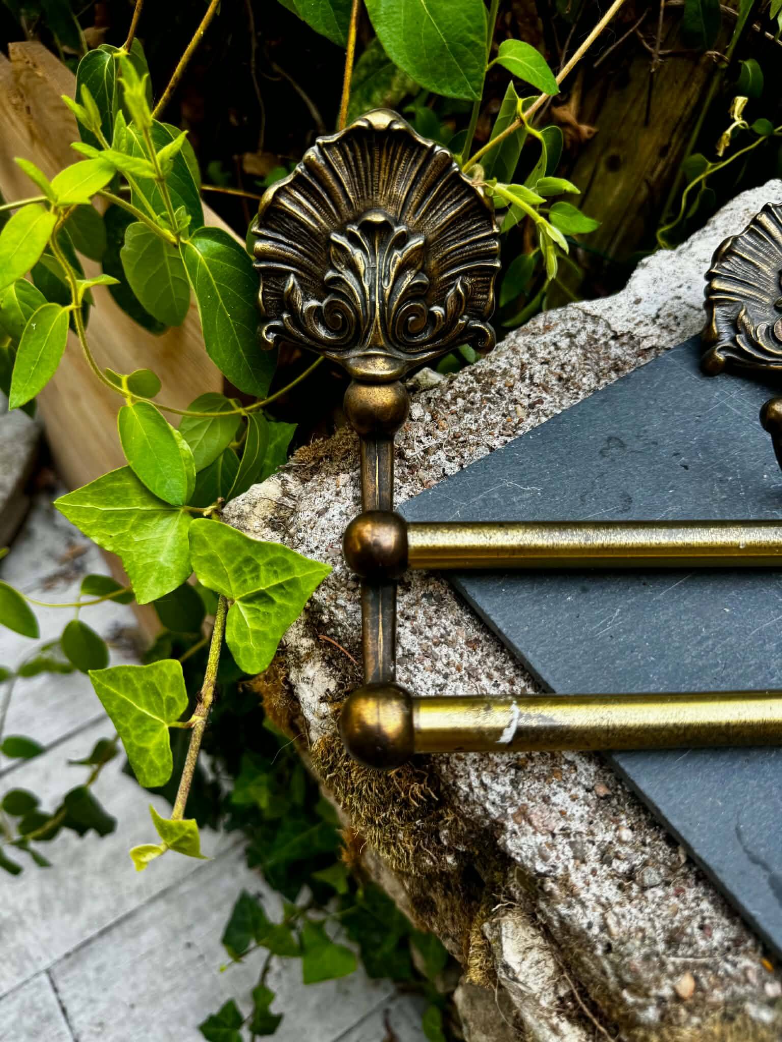 Set of bathroom hooks in Louis XV baroque style.