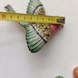 Two exotic birds in slip to hang