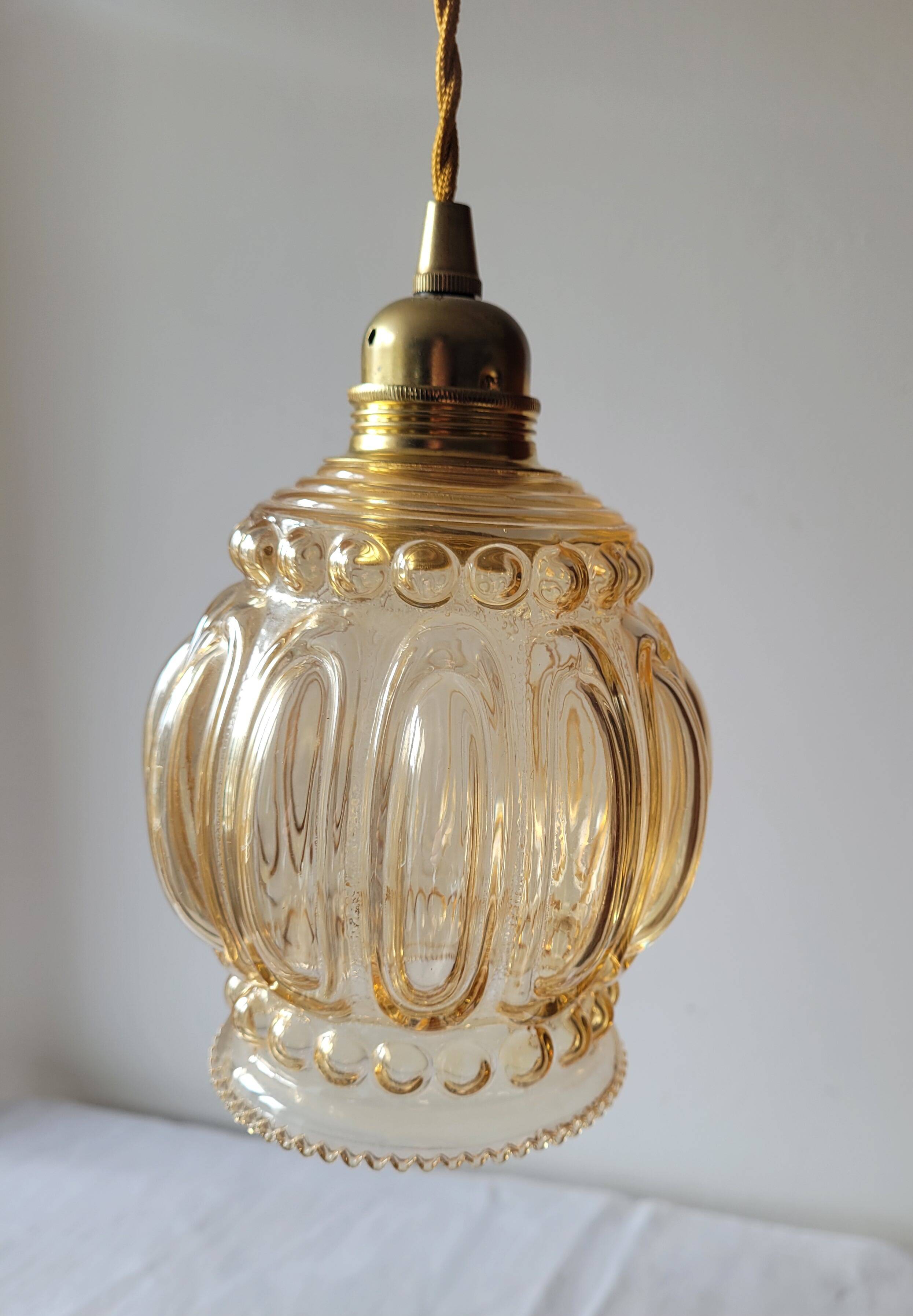 Duo of amber molded glass pendant lights