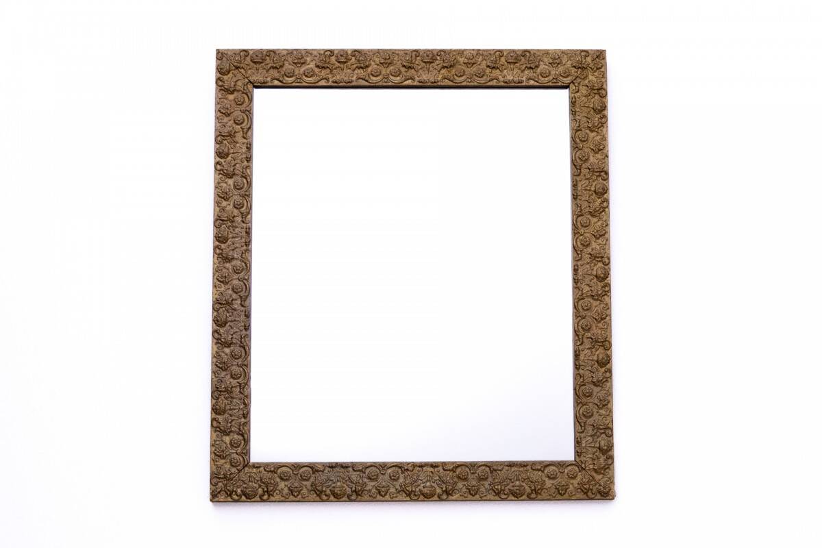 Old mirror in a gold frame.