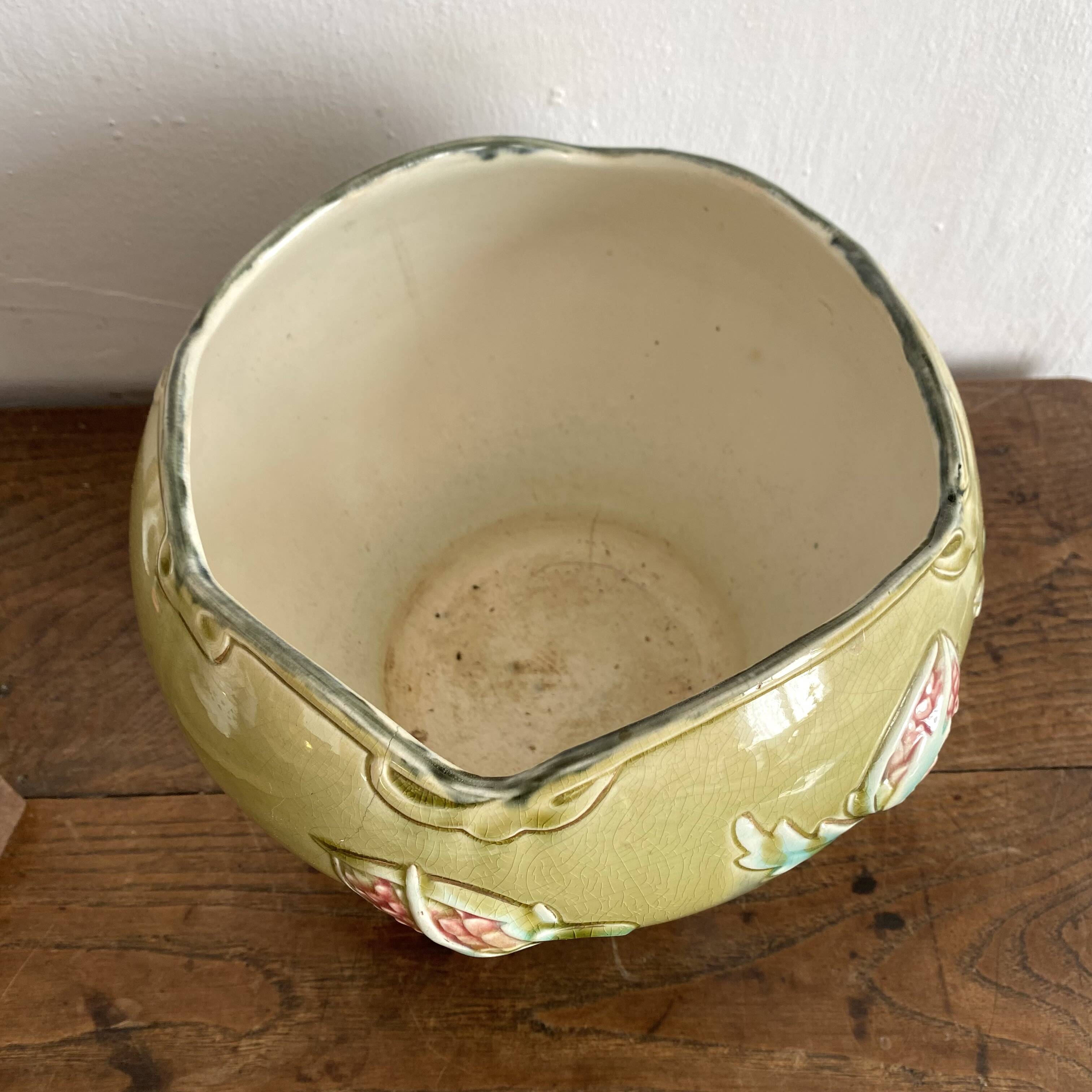 Large earthenware cache-pot in Art Nouveau style, decorated with thistles.