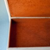 White wooden boxes decorated with Catalan trencadís style mosaics