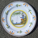 Earthenware plate with fisherman decoration