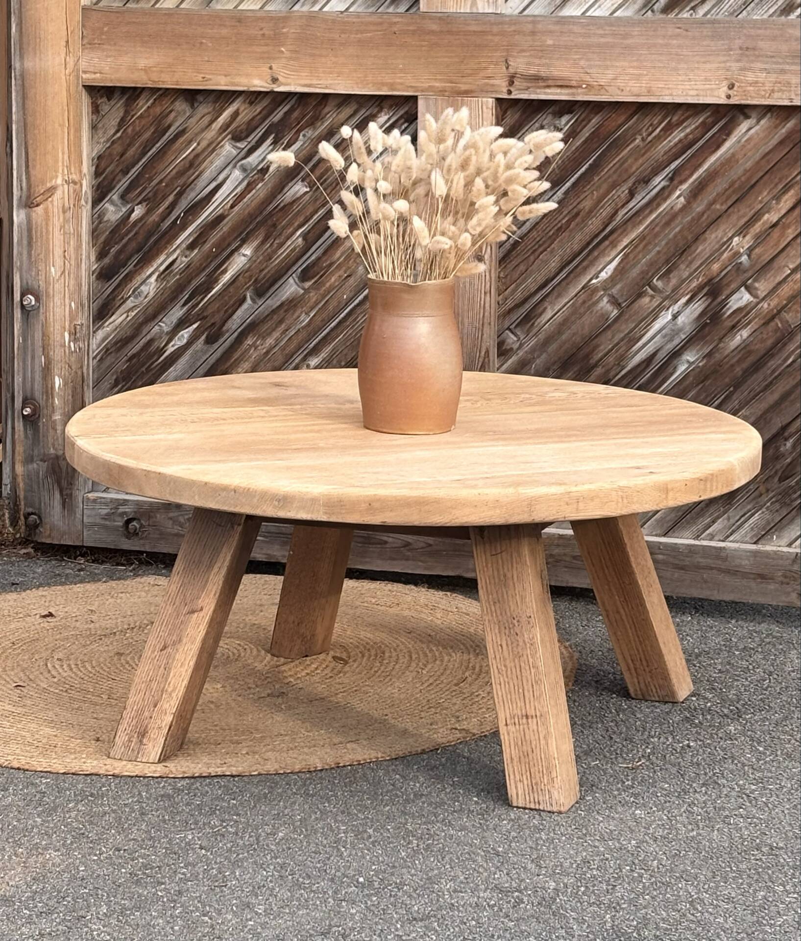Antique round coffee table in raw solid oak.