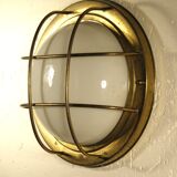 Brass "porthole" wall lamp
