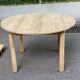 Scandinavian round extendable dining table stripped in solid wood from the 1970s.