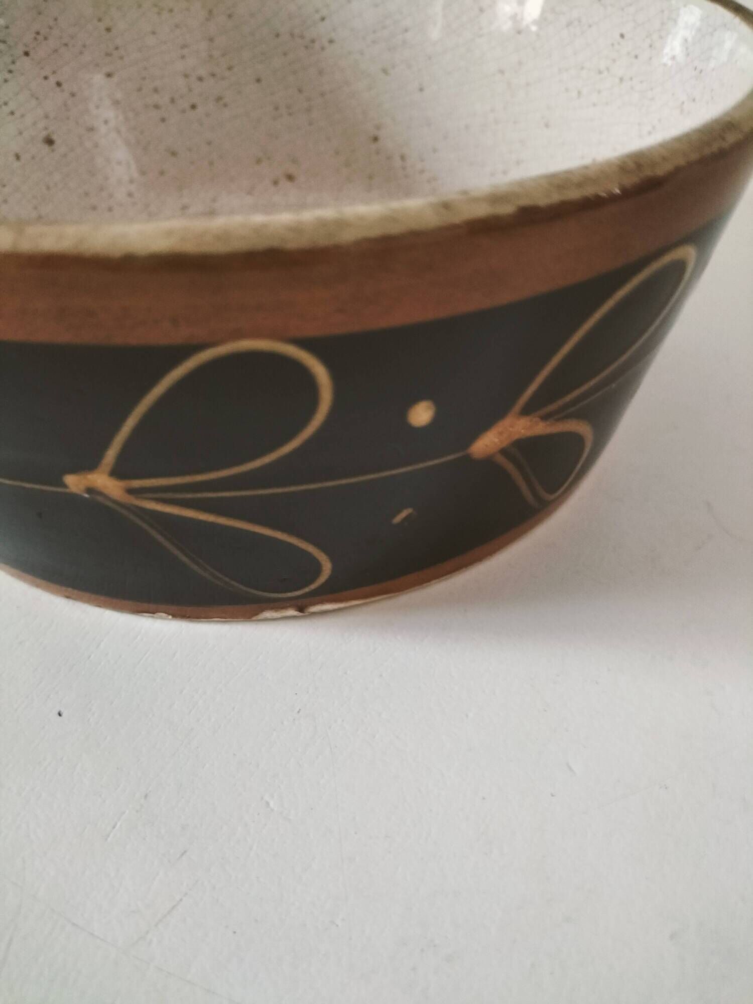 Vintage dish with black and ochre decoration and a speckled crackled interior – 1970s