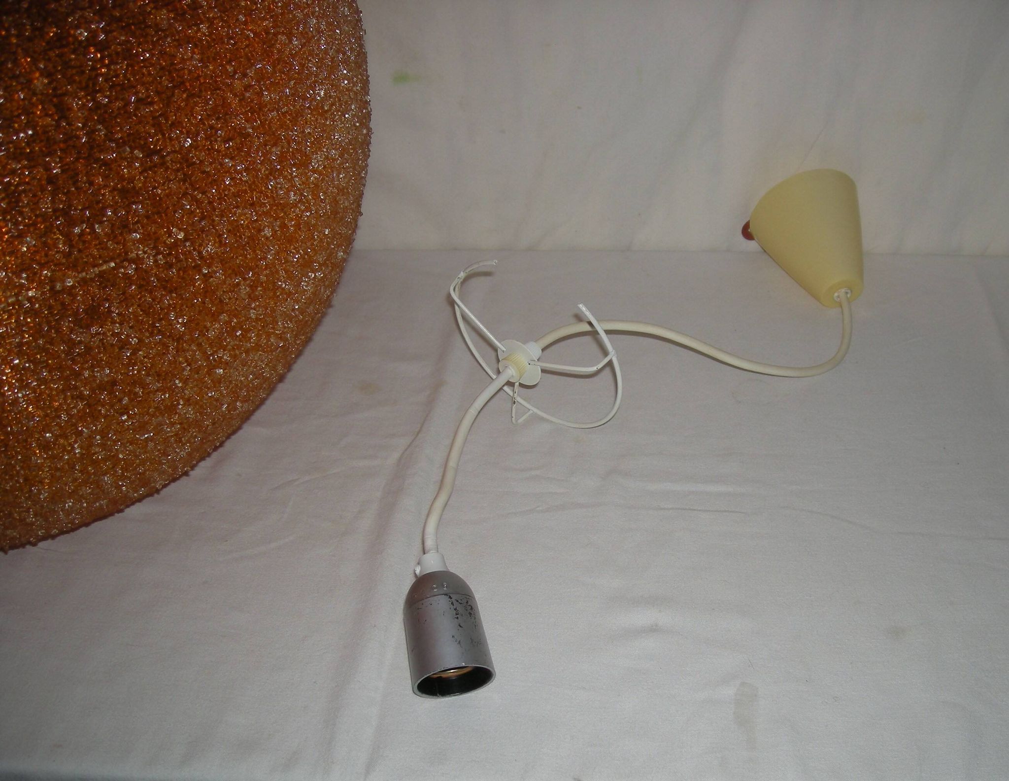 Suspension orange Sugar ball by John and Sylvia Reid from the 1960s.