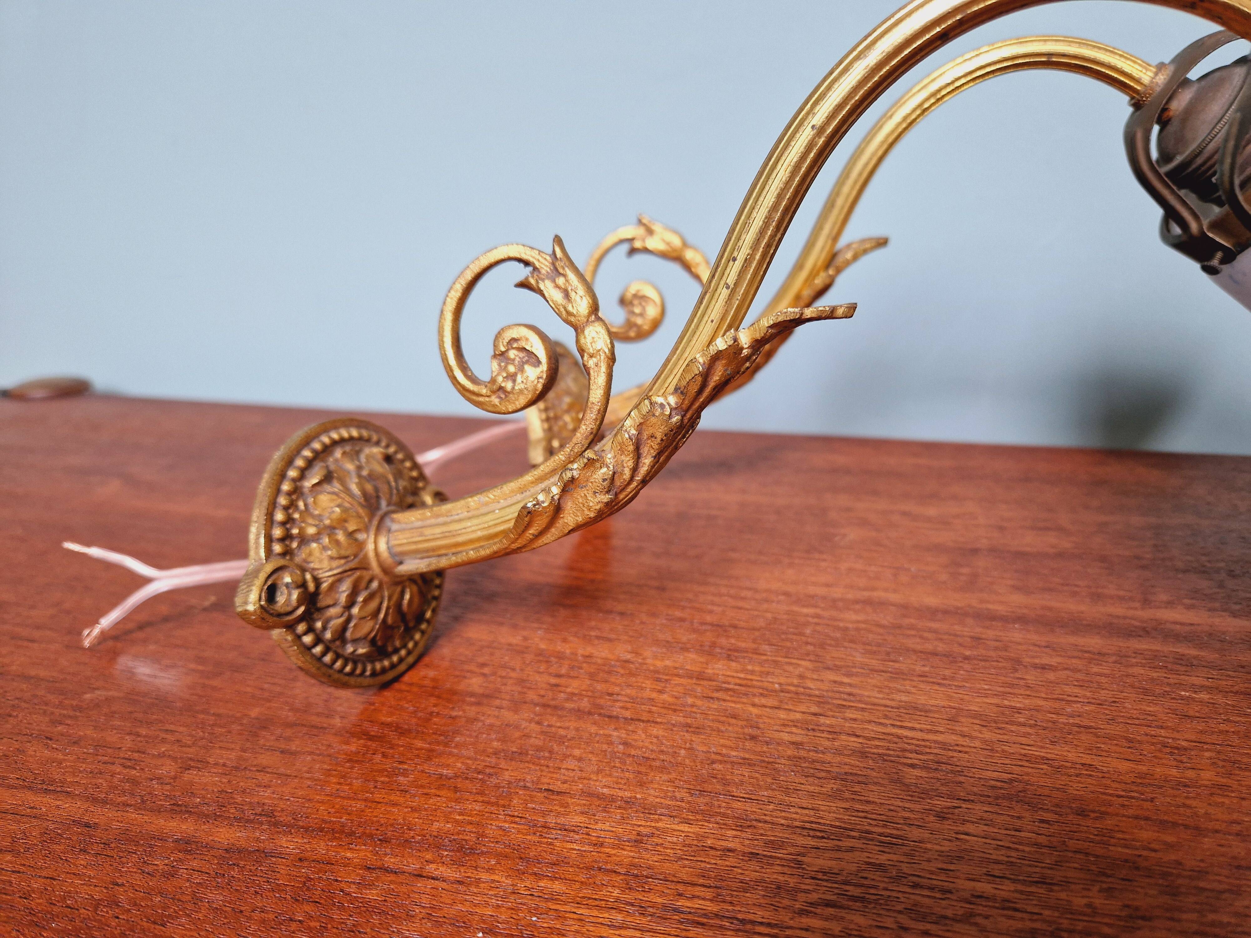 Pair of wall lights in bronze and marmoreal glass