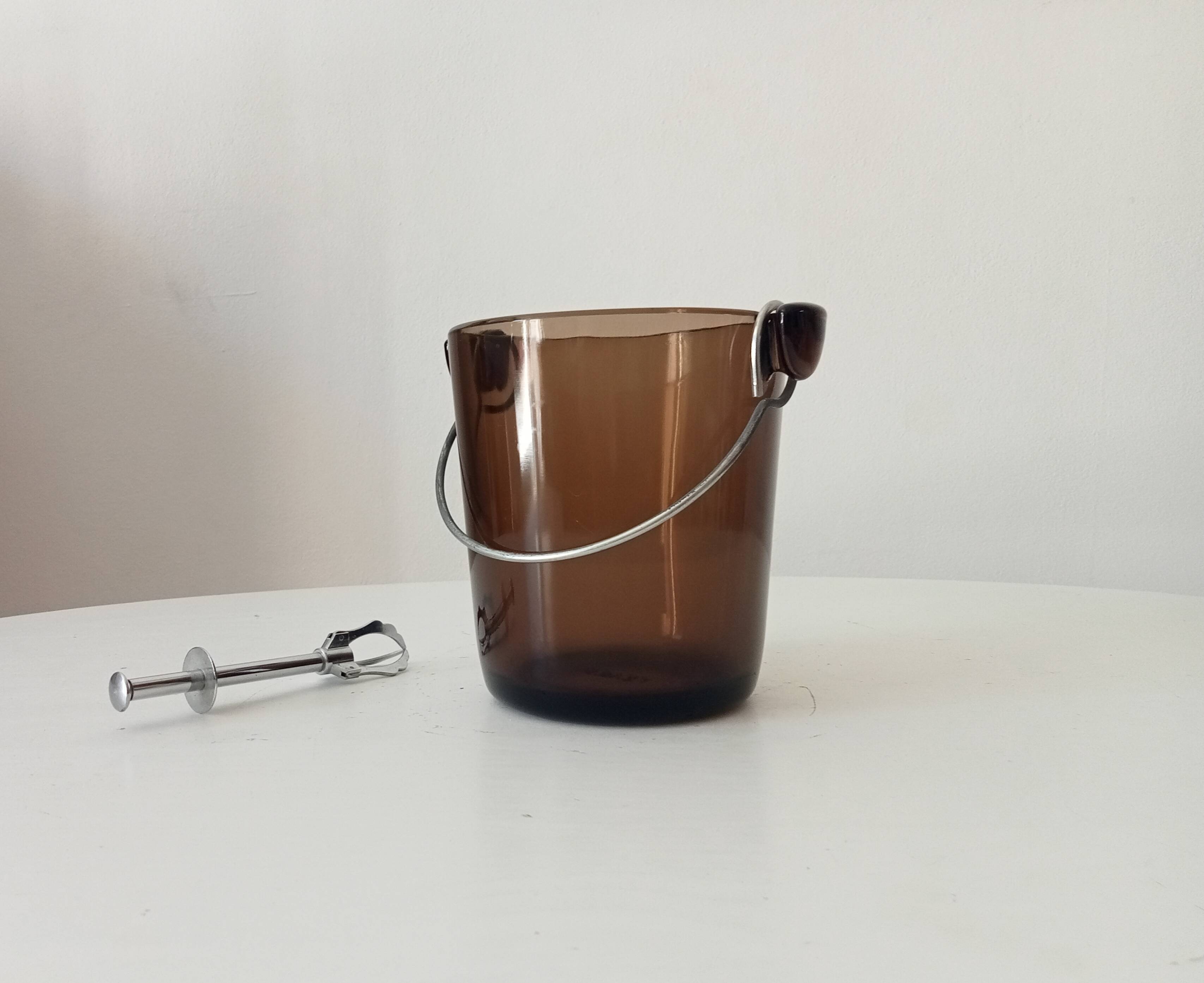 Vintage 1970s ice bucket and tongs.