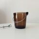 Vintage 1970s ice bucket and tongs.