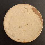 Round ashtray signed in sandstone with glazed interior