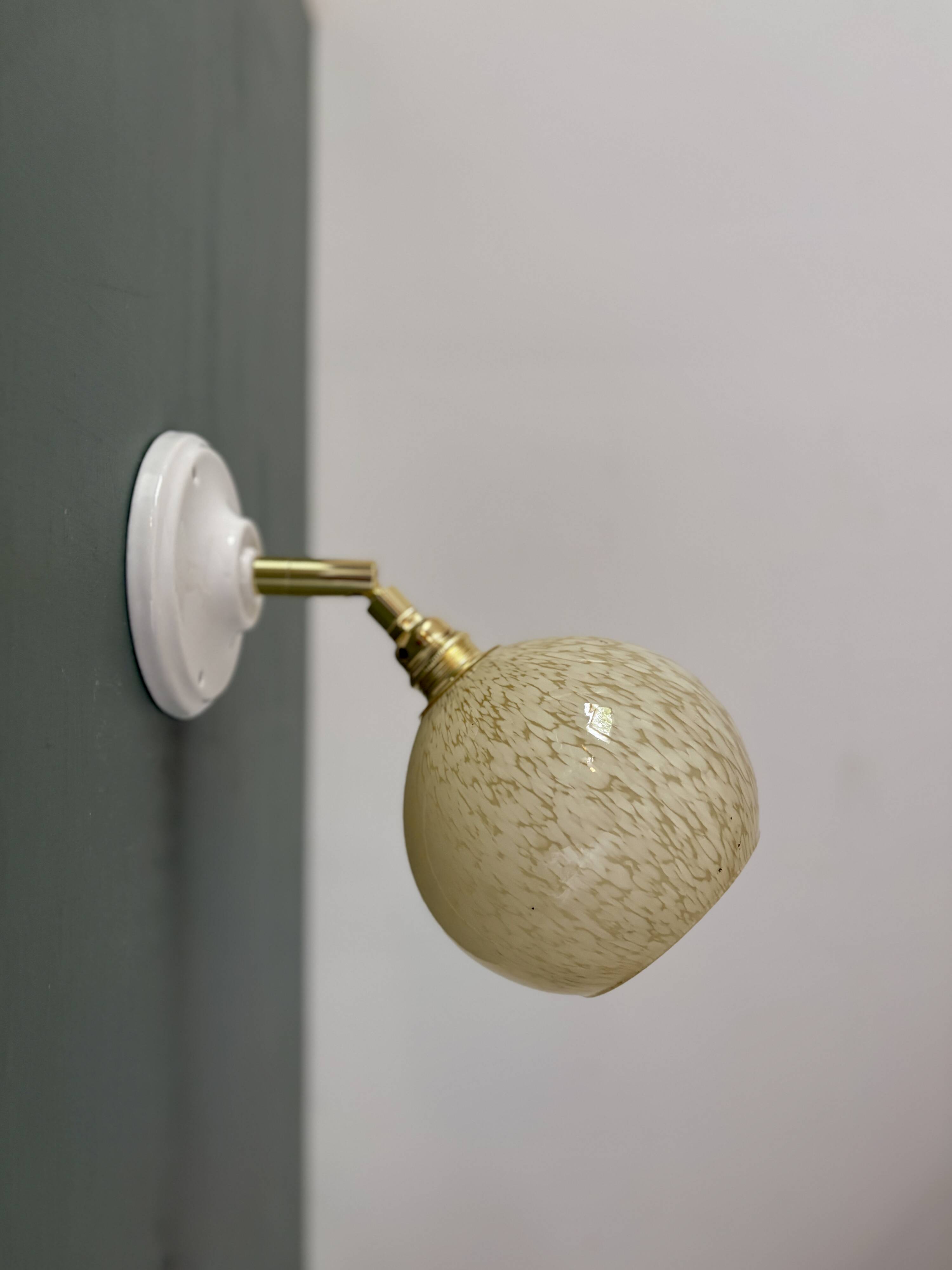Vintage glass globe wall light in pale yellow from Clichy.