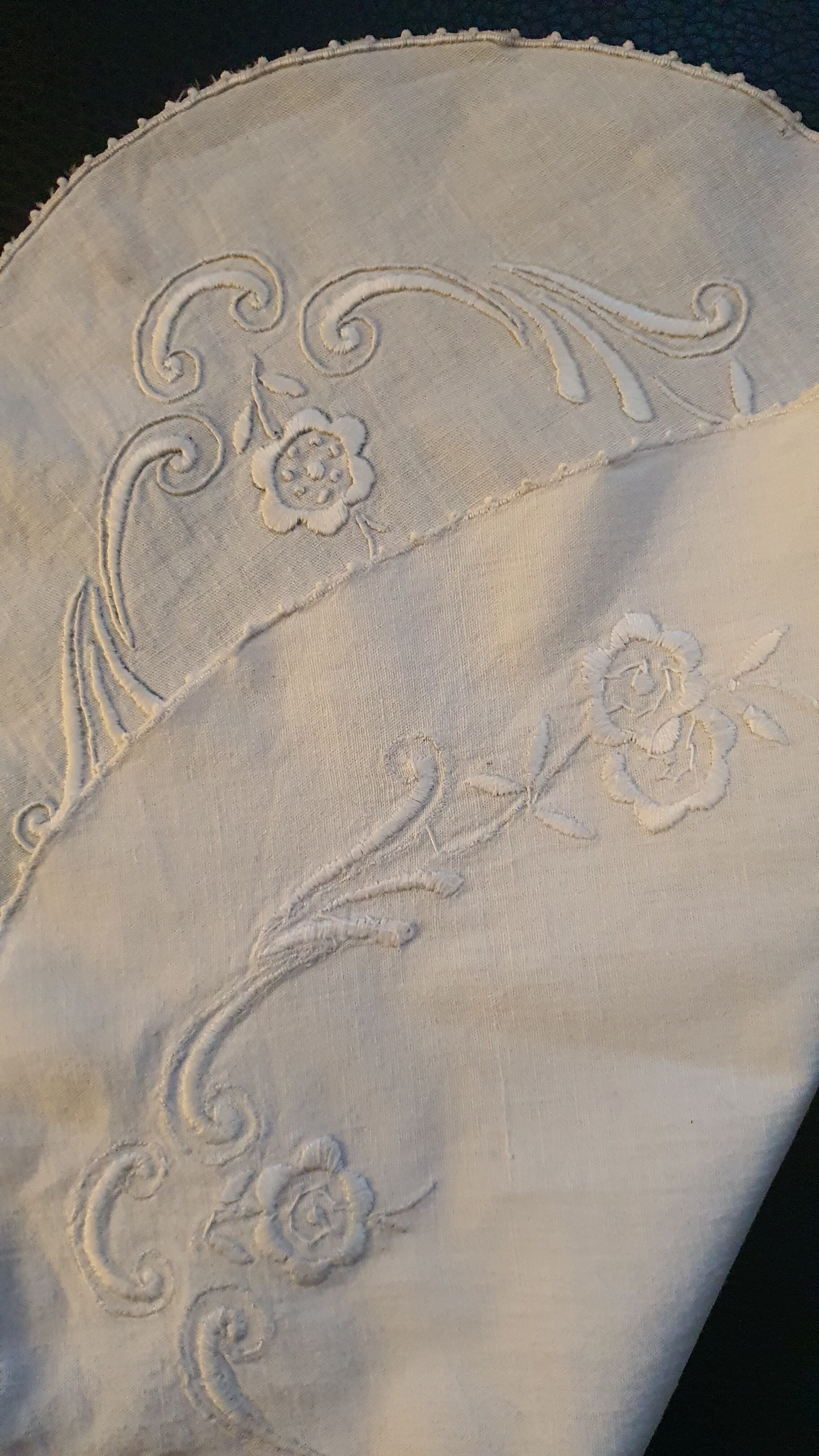 Hand-embroidered oval placemat