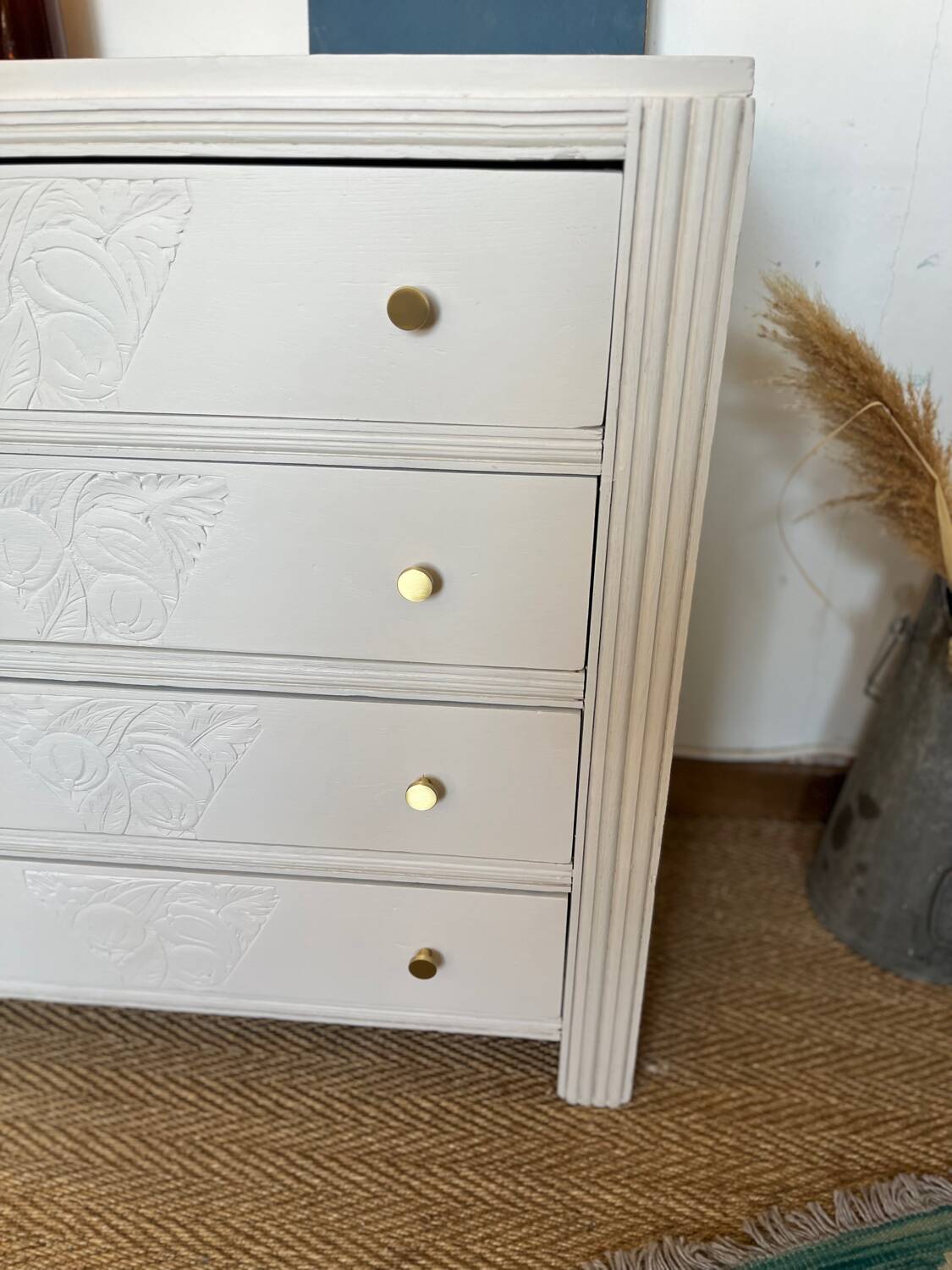 Restored wooden art deco chest of drawers with gilded handles