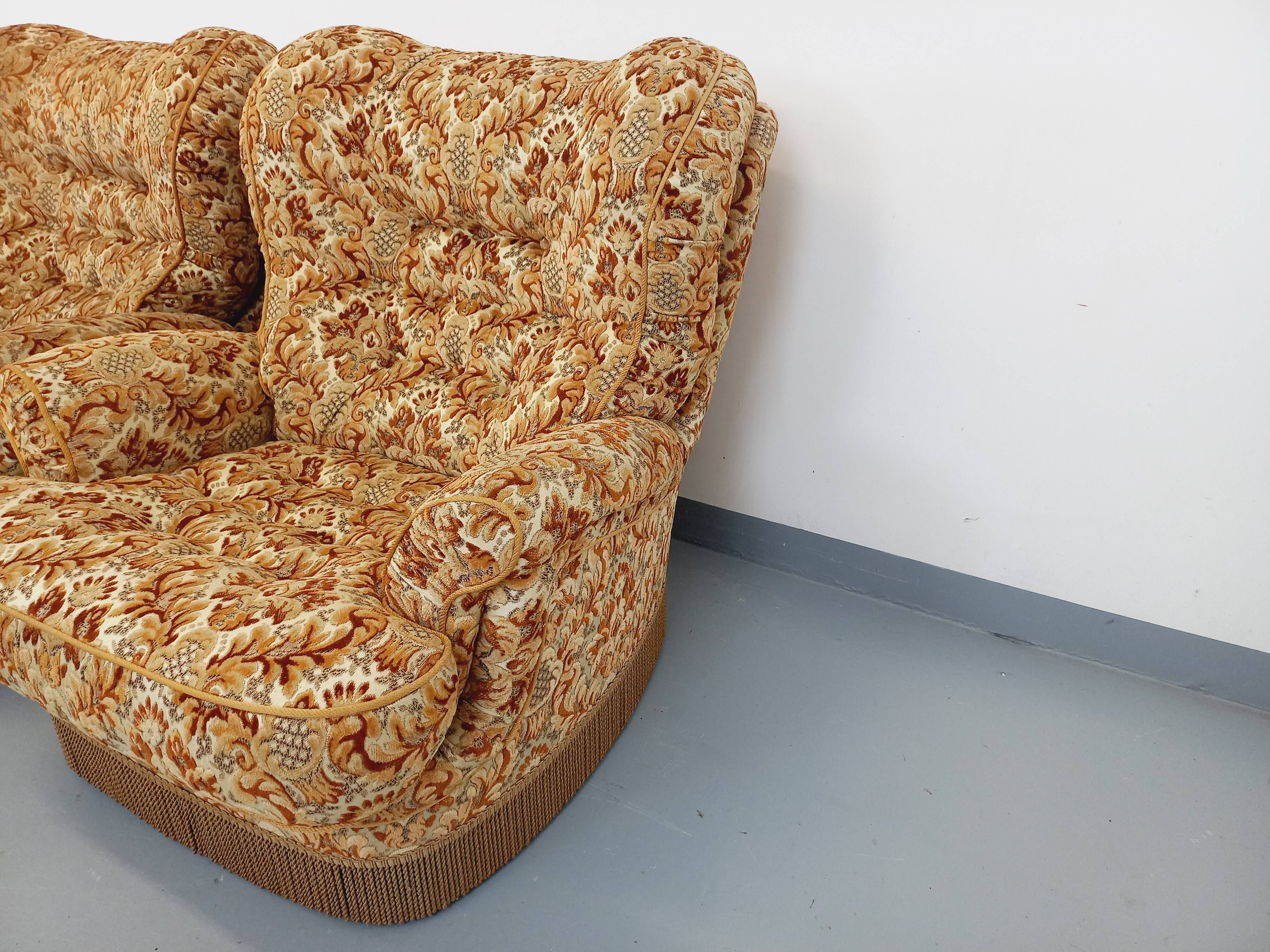 Set of 2 vintage armchairs in floral fabric with fringes from the 60s 70s