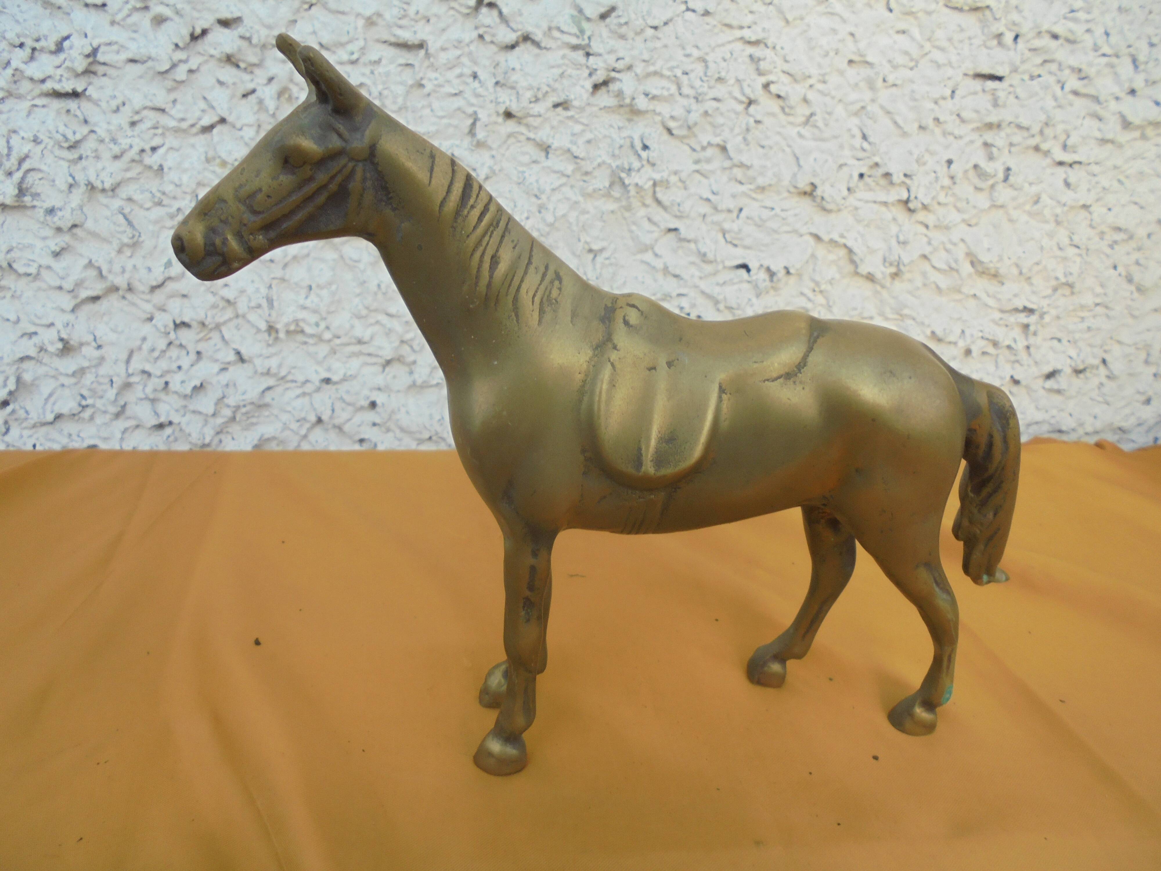 Brass saddled horse
