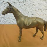Brass saddled horse