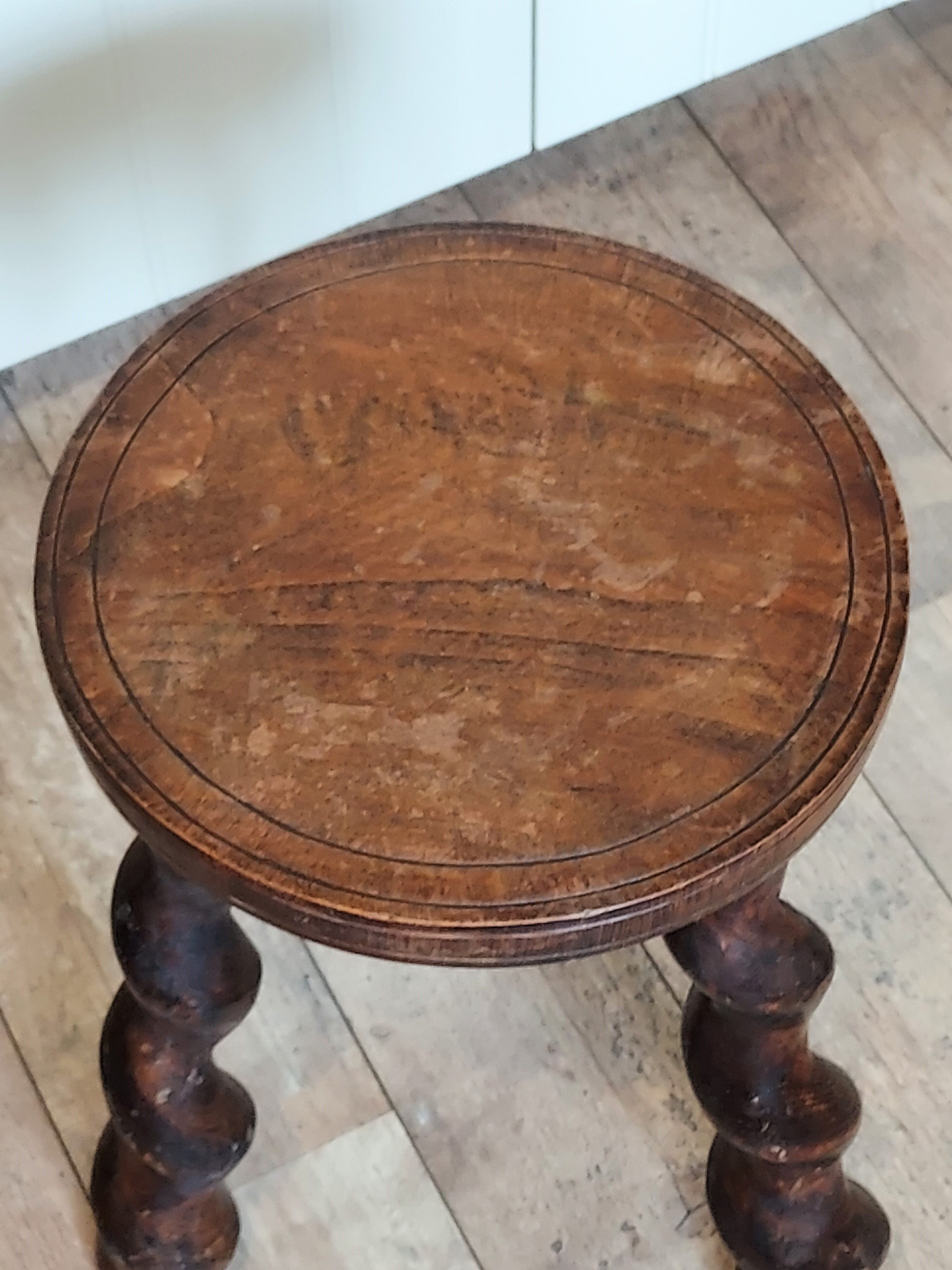 Carved wooden stool