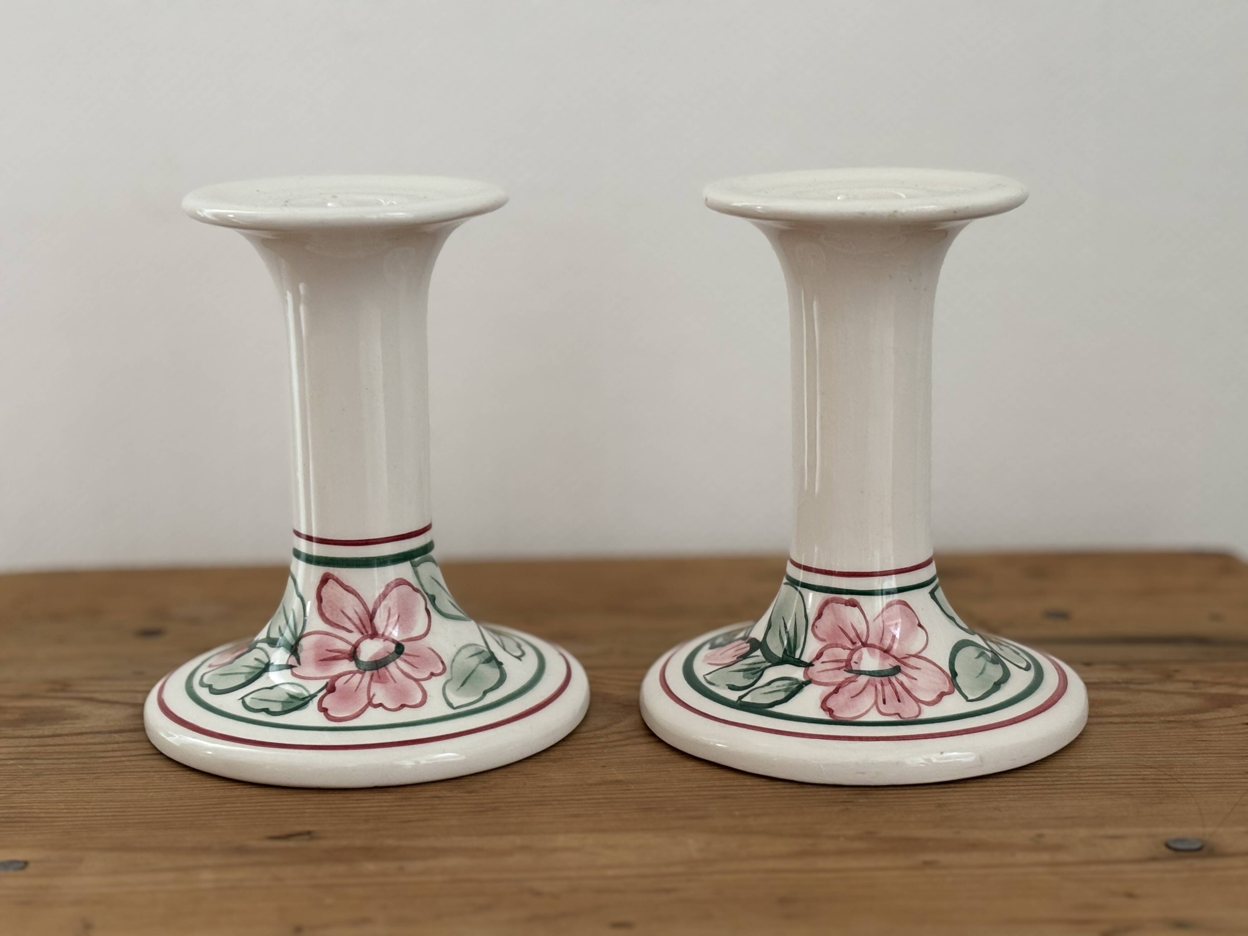 Pair of hand-painted English porcelain candlesticks