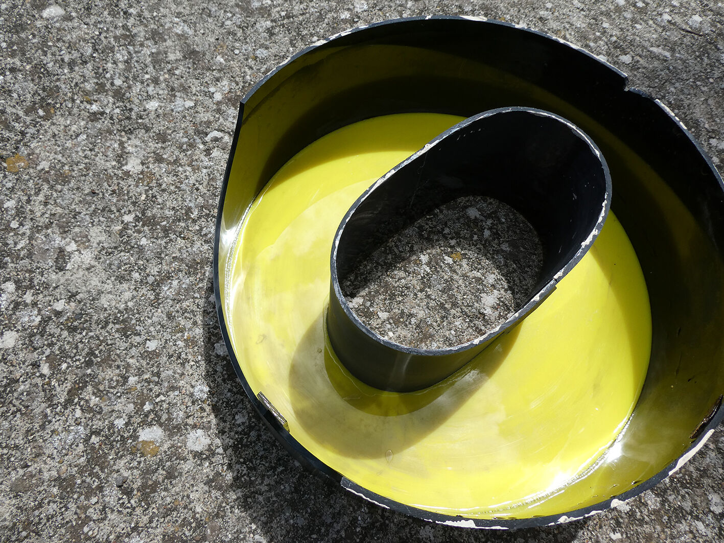 Letter "O" of industrial sign yellow and black