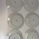 Six slightly hollow Limoges porcelain plates.