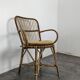 Set of 3 chairs and a rattan armchair.
