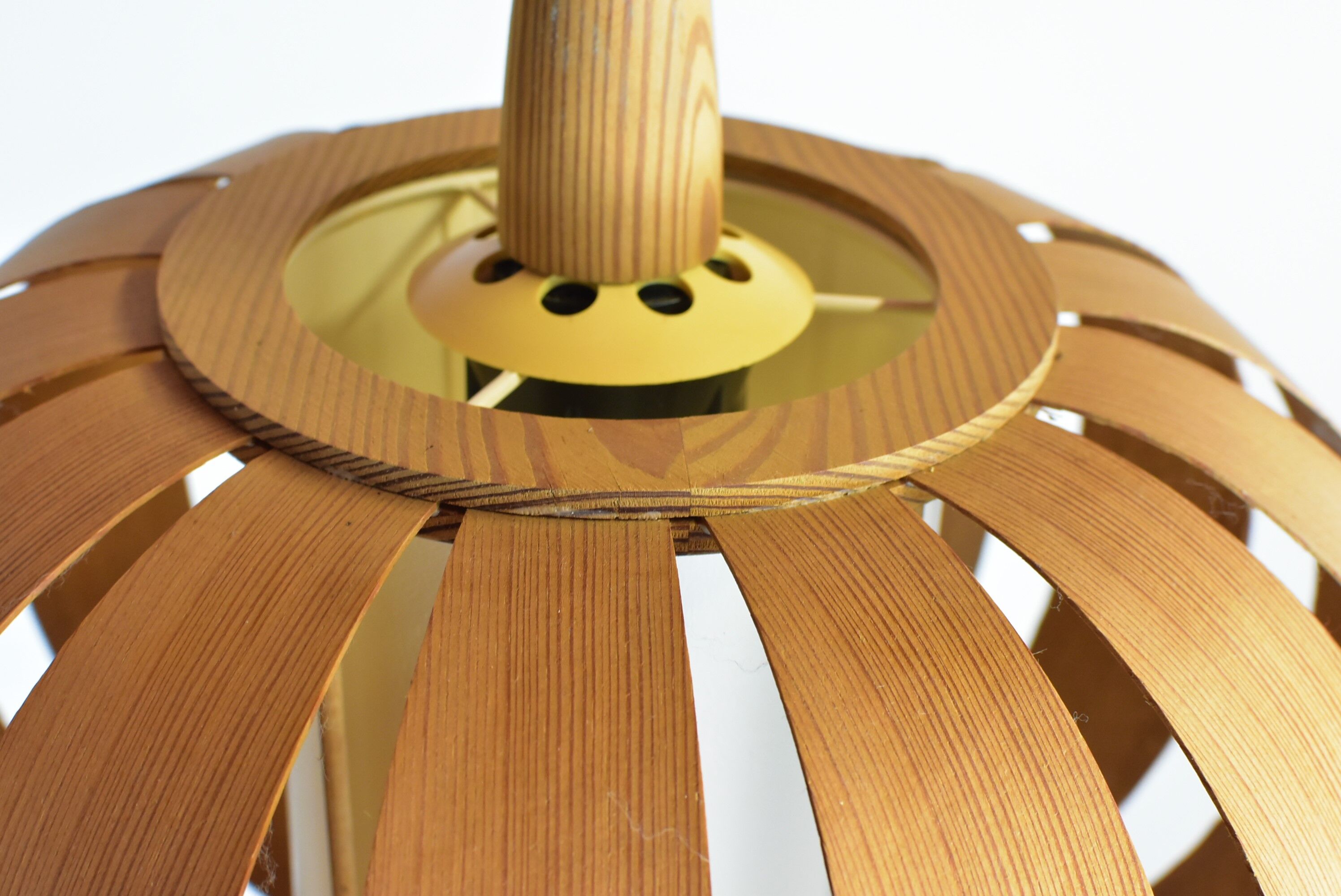 Scandinavian-style wooden pendant light.