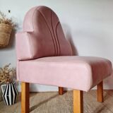 Single bar stool in pink stitched faux leather.