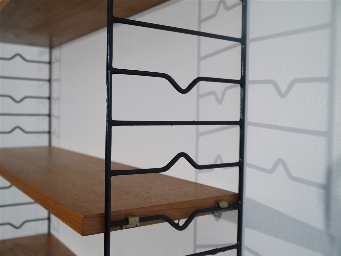 Scandinavian vintage shelf in teak "string" 1960