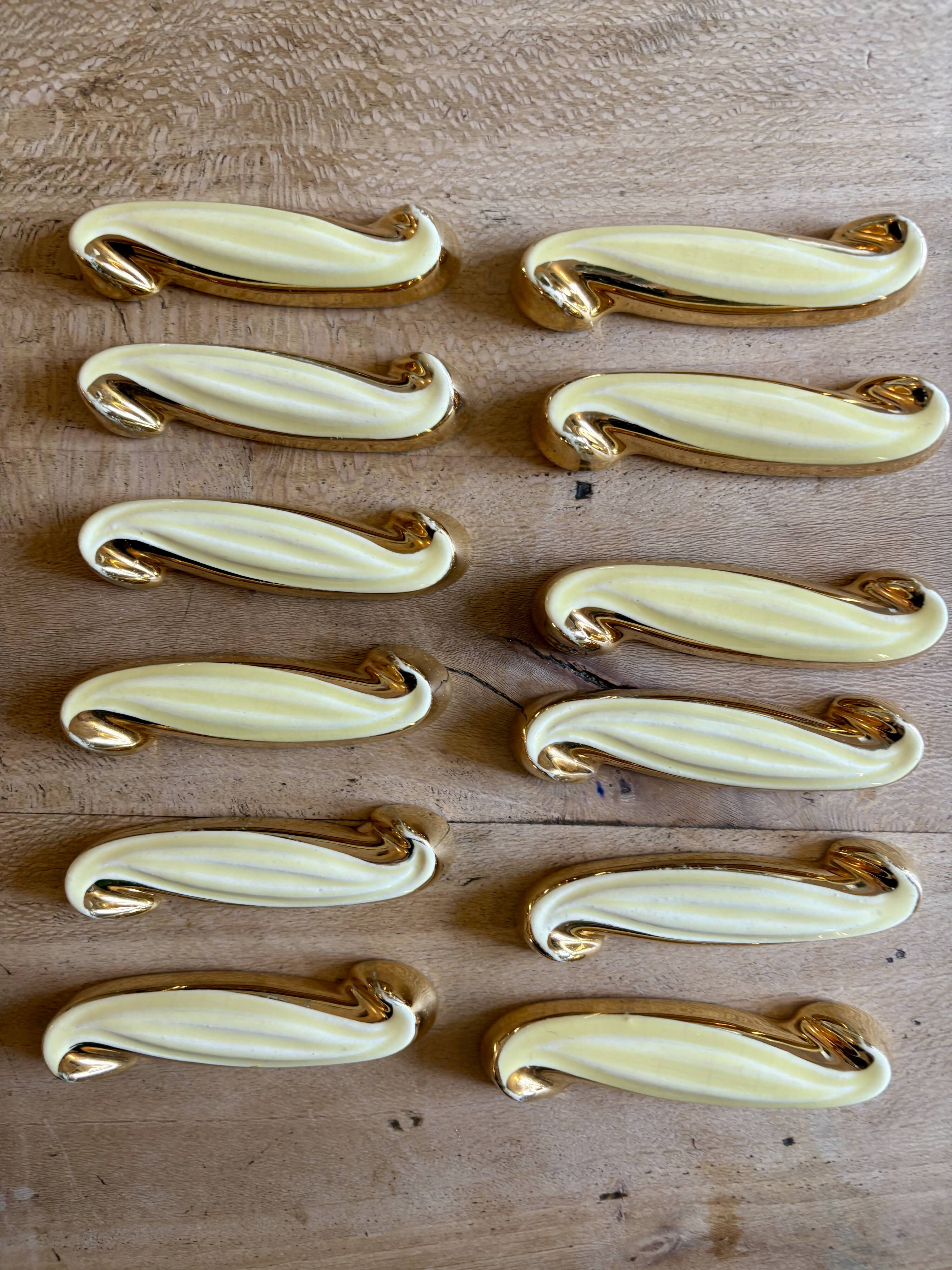 Set of 12 vintage art deco yellow and gold ceramic knife rests