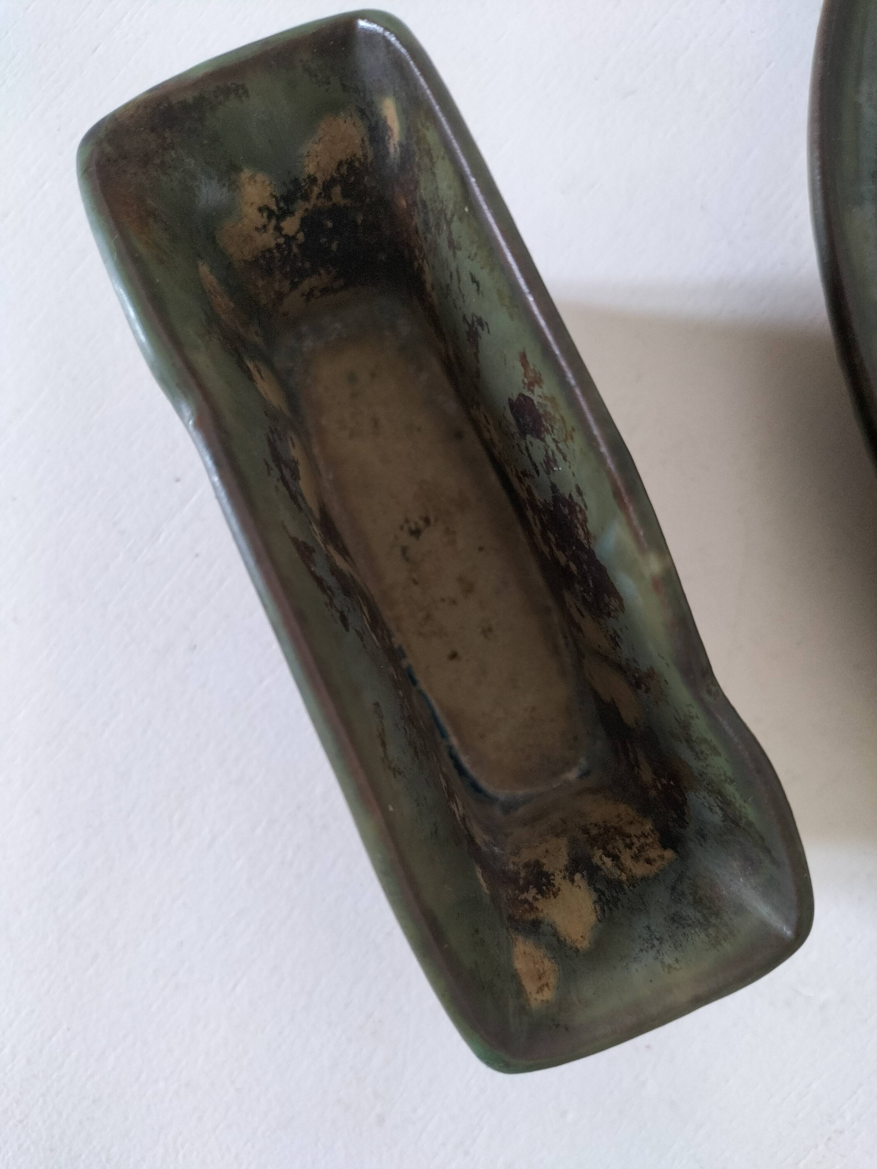 Pair of Denbac enamelled green and blue vide-poches.