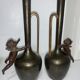 Paire de vases pichet en bronze