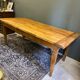 Old wooden table with drawer