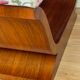 Art-deco walnut bench with floral fabric